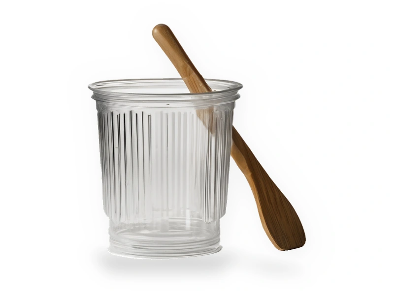 Representative image: graduated mixing cup, strainer and stir stick